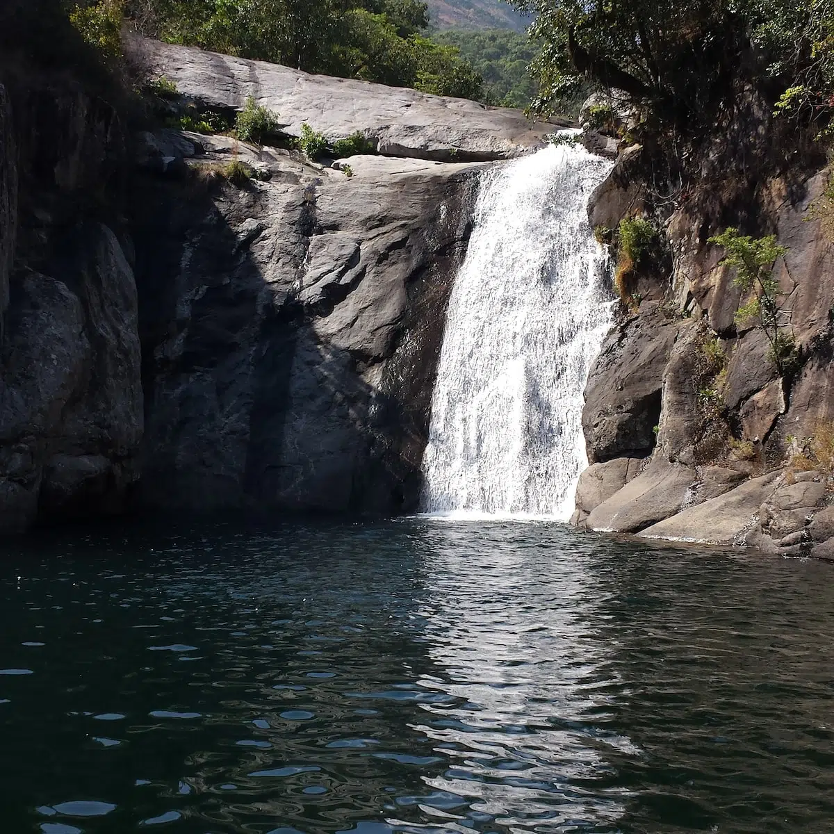 water falls on rocky mountain